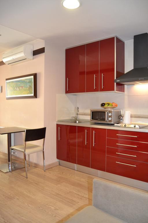Hotel Apartamentos Don Juan I Alcalá de Henares Quarto foto